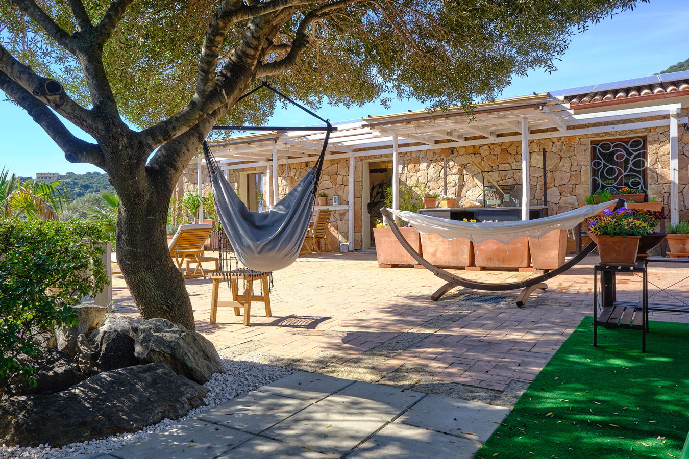 Gemütliche Hängematten im Aussenbereich des Ferienhaus.